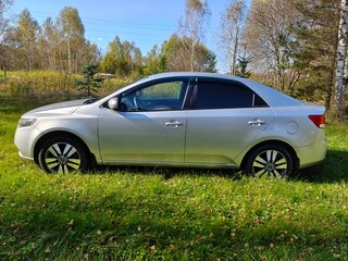2012 Kia Cerato 6-speed II, серебристый, 950000 рублей, вид 2