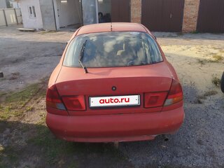 1996 Mitsubishi Carisma I, красный, 90000 рублей, вид 2