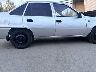 2011 Daewoo Nexia I Рестайлинг, серебристый, 100000 рублей, вид 2