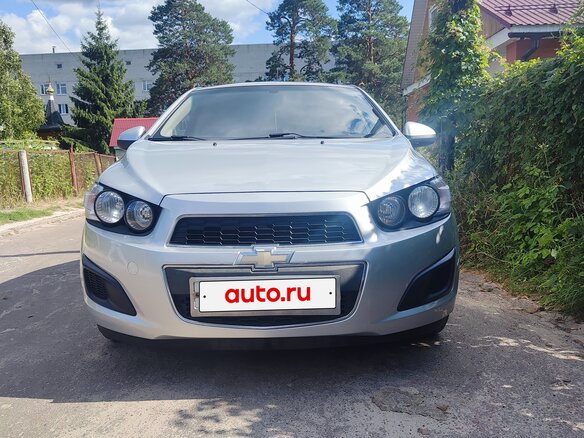 2012 Chevrolet Aveo II, серебристый, 570000 рублей - вид 1