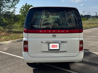 2006 Nissan Elgrand II (E51), белый, 1180000 рублей, вид 2