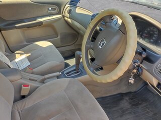 2003 Mazda Familia VIII (BJ), серебристый, 220000 рублей, вид 3