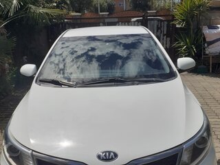 2016 Kia Rio III Рестайлинг, белый, 1200000 рублей, вид 2