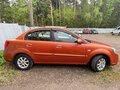 2011 Kia Rio II Рестайлинг, оранжевый, 490000 рублей - вид 4