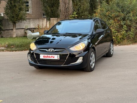 2014 Hyundai Solaris I, чёрный, 870000 рублей, вид 2