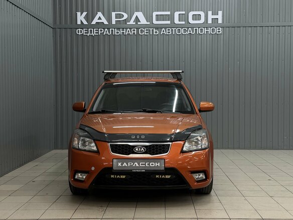 2010 Kia Rio II Рестайлинг, оранжевый, 620000 рублей - вид 2