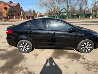 2012 Kia Rio 5-speed III, чёрный, 620000 рублей, вид 5