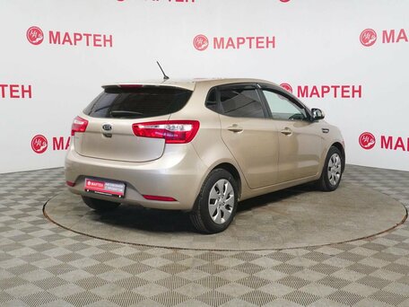 2012 Kia Rio 5-speed III, бежевый, 735000 рублей, вид 5