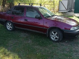 2006 Daewoo Nexia I, красный, 245000 рублей, вид 2