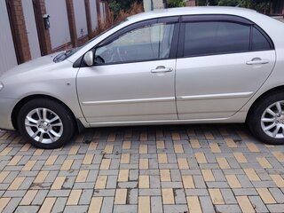 2006 Toyota Corolla IX (E120, E130) Рестайлинг, серебристый, 700000 рублей, вид 3