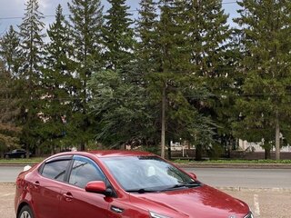 2012 Kia Rio 5-speed III, красный, 650000 рублей, вид 2