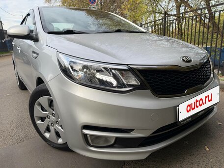 2015 Kia Rio 6-speed III, серый, 955000 рублей, вид 3