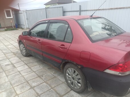 2006 Mitsubishi Lancer IX Рестайлинг, красный, 220000 рублей, вид 3