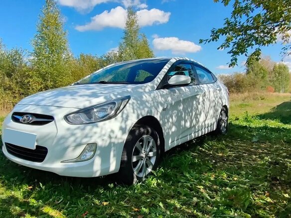 2011 Hyundai Solaris I, белый, 720000 рублей - вид 8