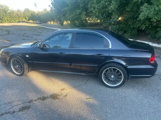 2007 Hyundai Sonata ТагАЗ IV (EF) Рестайлинг, чёрный, 650000 рублей, вид 2