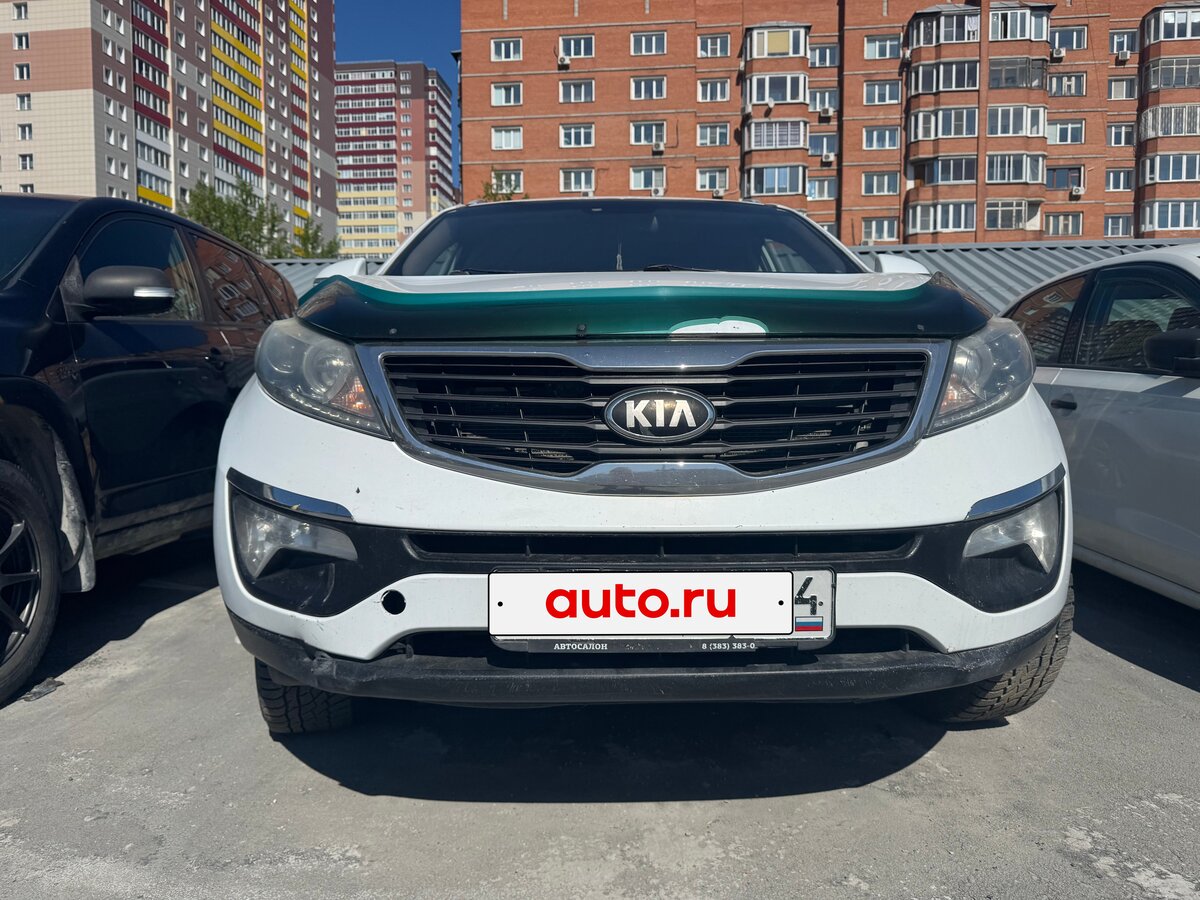 Открыть фотографии: Kia Sportage III