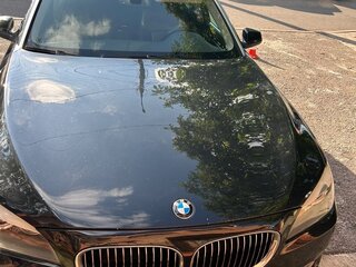 2010 BMW 7 серии Long 750Li xDrive V (F01/F02/F04), чёрный, 1000000 рублей, вид 3