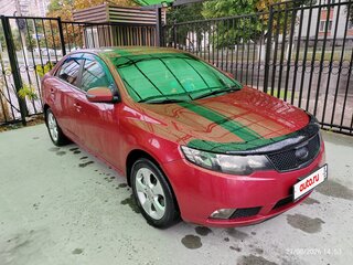 2010 Kia Cerato 4-speed II, красный, 600000 рублей, вид 3