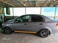 2010 Chevrolet Aveo I Рестайлинг, серый, 430000 рублей - вид 2