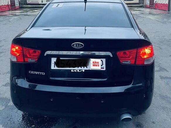 2011 Kia Cerato 4-speed II, чёрный, 700000 рублей - вид 2