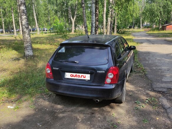 2002 Mazda 323 VI (BJ) Рестайлинг, чёрный, 100000 рублей - вид 2