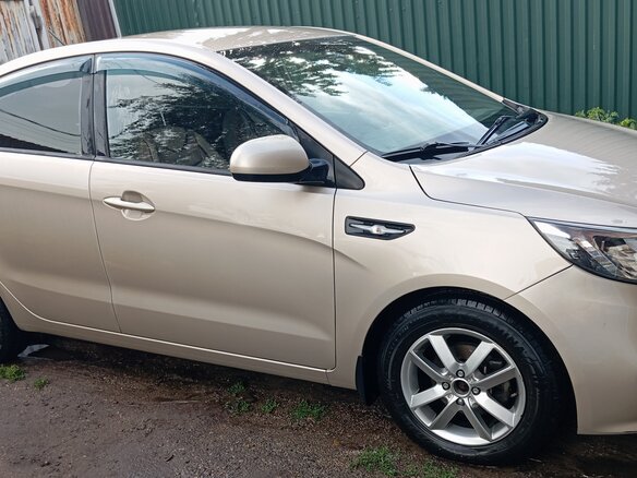2015 Kia Rio III Рестайлинг, бежевый, 1220000 рублей - вид 2
