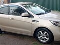 2015 Kia Rio III Рестайлинг, бежевый, 1220000 рублей - вид 2