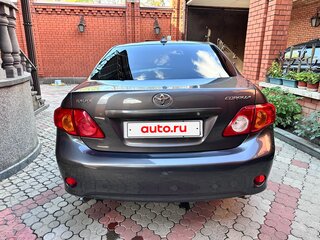 2010 Toyota Corolla X (E140, E150), серый, 990000 рублей, вид 5