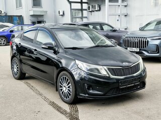 2011 Kia Rio 5-speed III, чёрный, 549000 рублей, вид 2