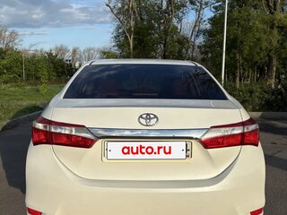 2014 Toyota Corolla XI (E160, E170, E180), белый, 1320000 рублей, вид 5