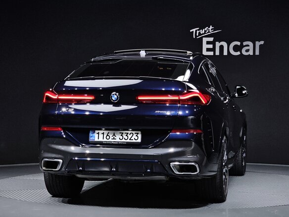 2024 BMW X6 40i III (G06) Рестайлинг, синий - вид 2