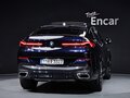 2024 BMW X6 40i III (G06) Рестайлинг, синий - вид 2