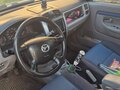 2002 Mazda Demio I (DW), серебристый, 150000 рублей - вид 4
