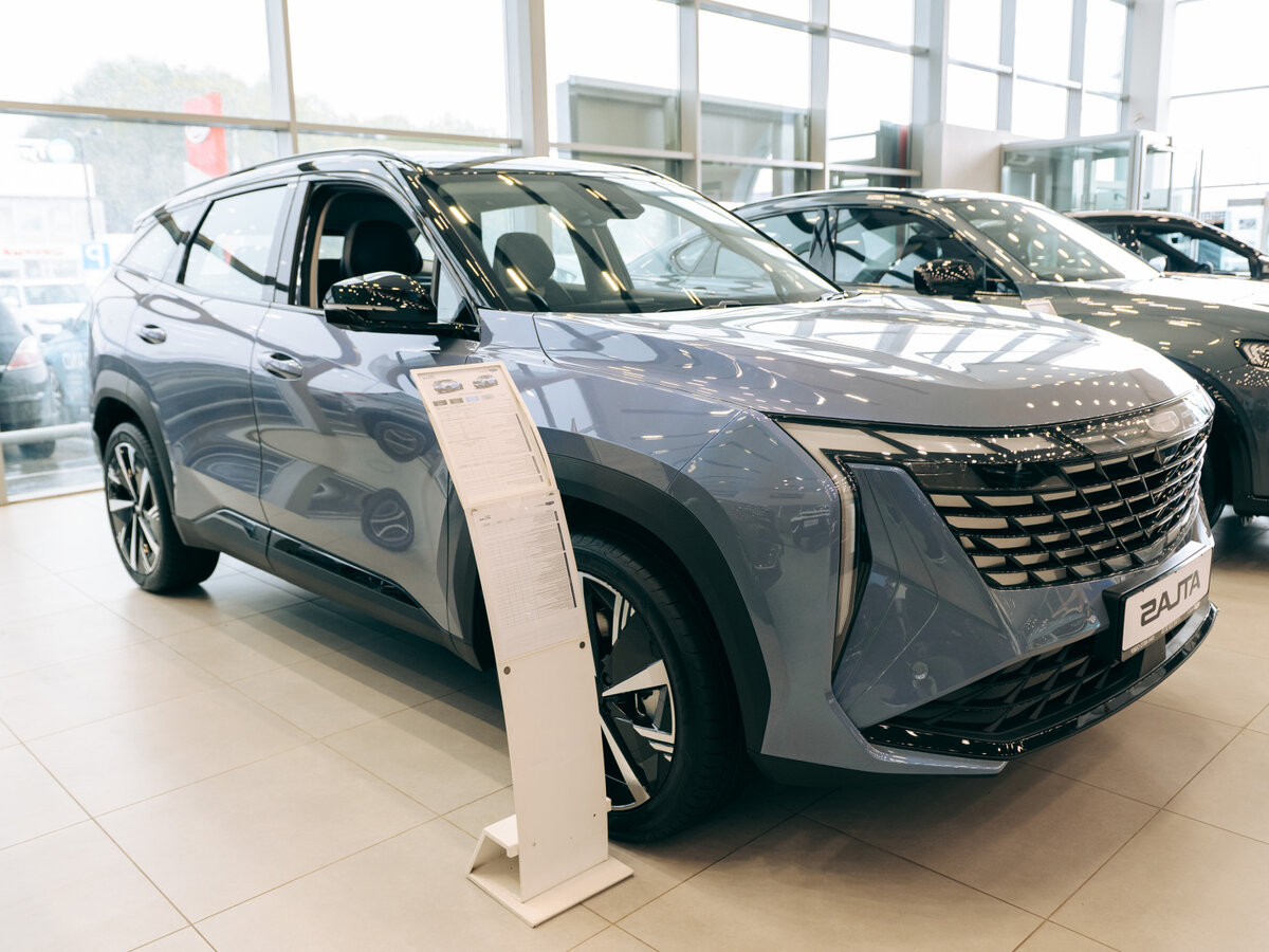 Открыть фотографии: Geely Atlas II