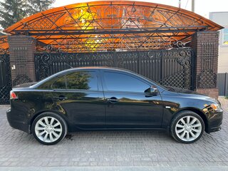 2011 Mitsubishi Lancer X Рестайлинг, чёрный, 1200000 рублей, вид 4
