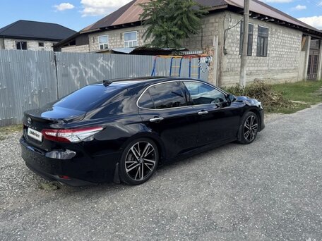 2021 Toyota Camry VIII (XV70) Рестайлинг, чёрный, 2850000 рублей, вид 4