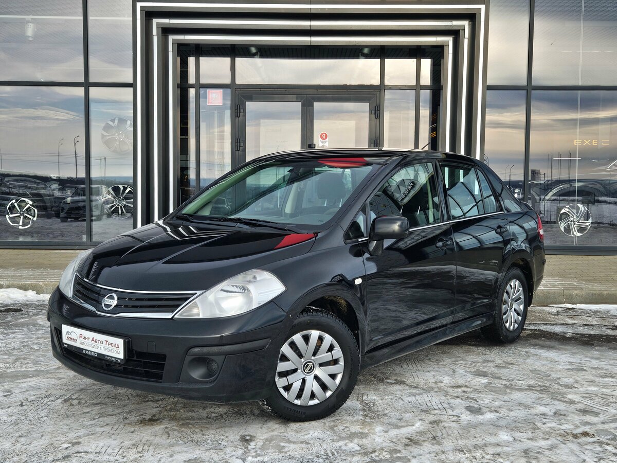 Открыть фотографии: Nissan Tiida I Рестайлинг