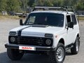 1997 Lada (ВАЗ) 2121 (4x4) I Рестайлинг, белый, 340000 рублей - вид 1