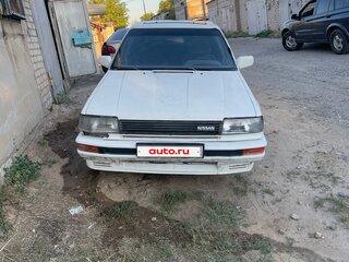 1986 Nissan Bluebird VIII (T12, T72), белый, 70000 рублей, вид 1