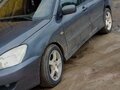 2005 Mitsubishi Lancer IX, серый, 235000 рублей - вид 9