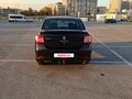 2014 Renault Logan II, чёрный, 566800 рублей - вид 1