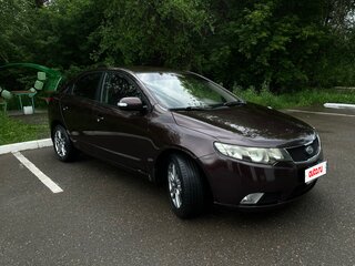 2010 Kia Cerato 5-speed II, пурпурный, 729000 рублей, вид 2