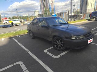 2012 Daewoo Nexia I Рестайлинг, чёрный, 100000 рублей, вид 2
