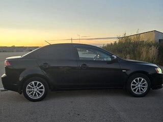 2011 Mitsubishi Lancer X Рестайлинг, чёрный, 650000 рублей, вид 3