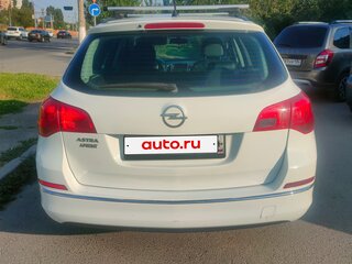 2013 Opel Astra J Рестайлинг, белый, 1190000 рублей, вид 4