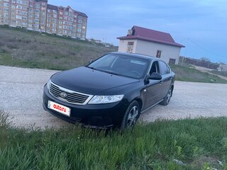 2010 Kia Magentis 5-speed II Рестайлинг, чёрный, 720000 рублей, вид 1