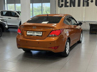 2015 Hyundai Solaris I Рестайлинг, оранжевый, 895000 рублей, вид 5