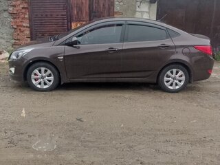 2016 Hyundai Solaris I Рестайлинг, коричневый, 790000 рублей, вид 2