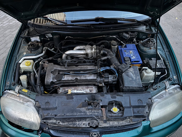1997 Mazda 323 V (BA), зелёный, 255000 рублей - вид 12