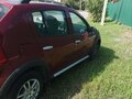 2012 Renault Sandero I, красный, 640000 рублей - вид 1